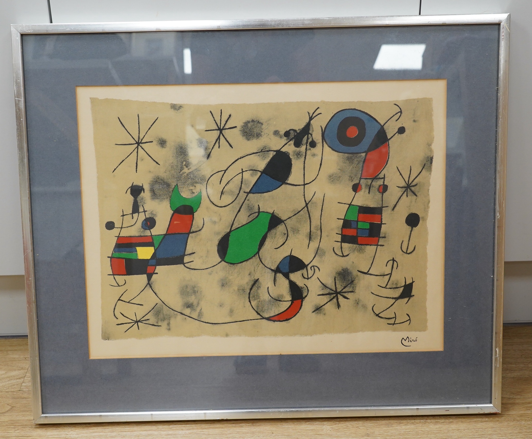 After Joan Miro (Spanish, 1893-1983), surreal colour print, ‘L'Envolée', 38 x 49cm. Condition - fair